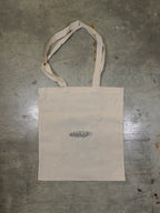 Rückansicht der naturfarbenen Baumwoll-Totebag mit Logo Print