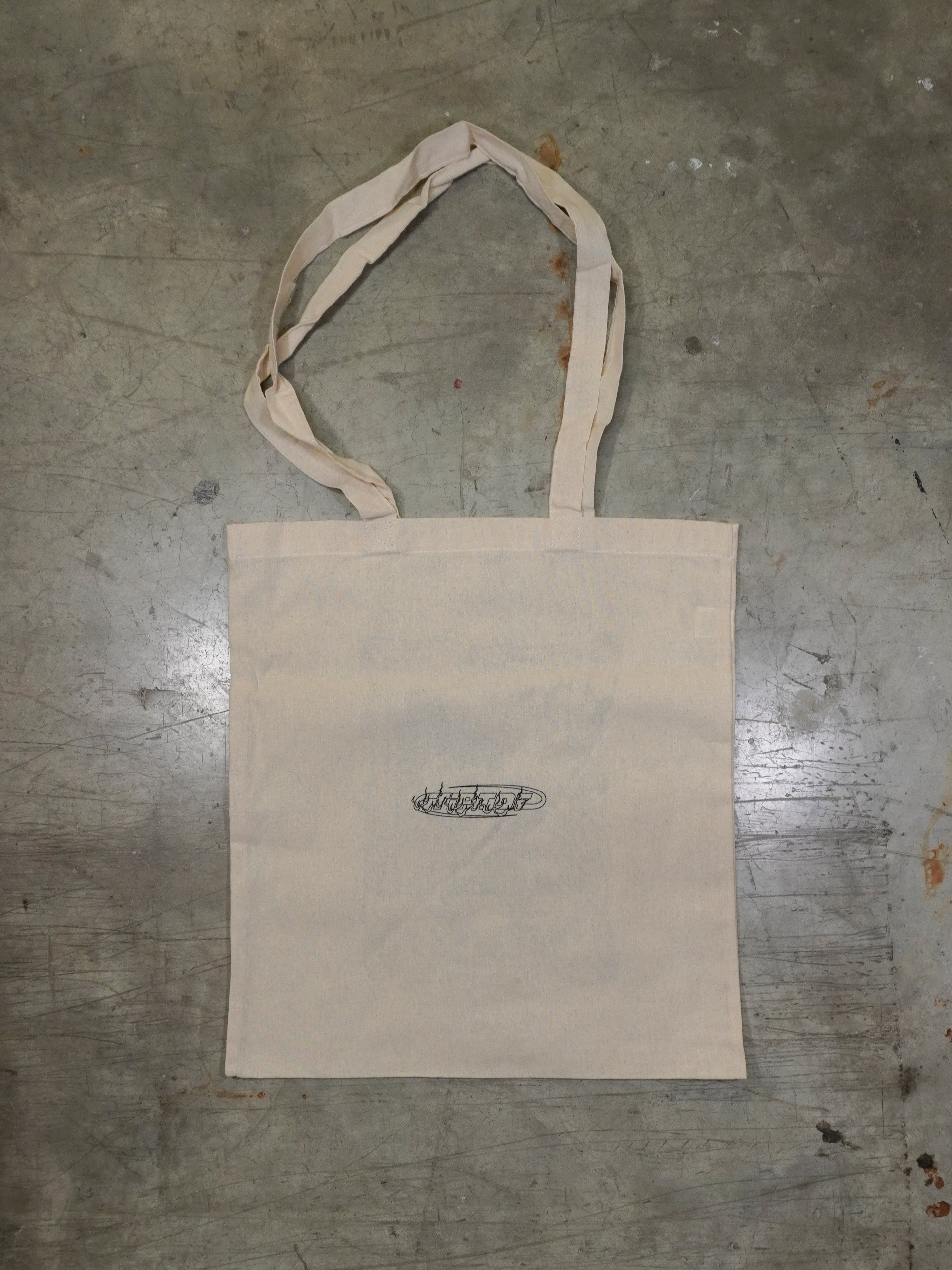 Rückansicht der naturfarbenen Baumwoll-Totebag mit Logo Print